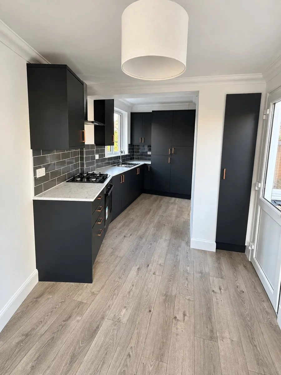 Repainted kitchen with navy cabinetry and copper handles, Colinton, Edinburgh