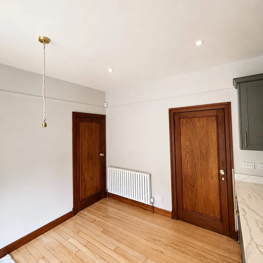 Repainted room with painted doors and radiator, Edinburgh