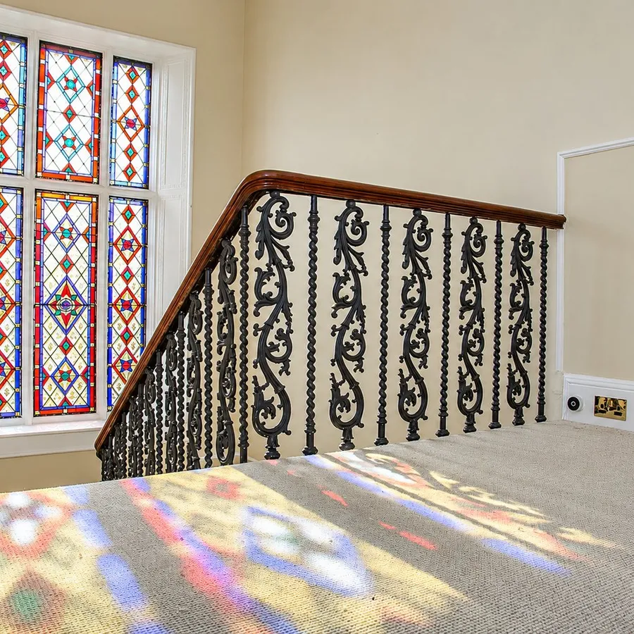 Repainted staircase with original stained glass window, The Grange, Edinburgh